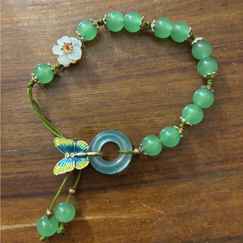 Green Beaded Bracelet with Butterfly Charm